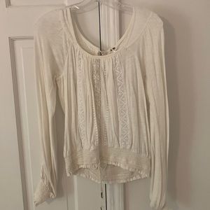 Free People XS long sleeve top. Like new condition- only worn once.